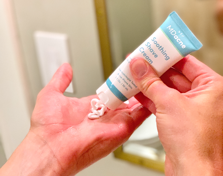 Man applying MDacne Soothing Shave Cream to hand