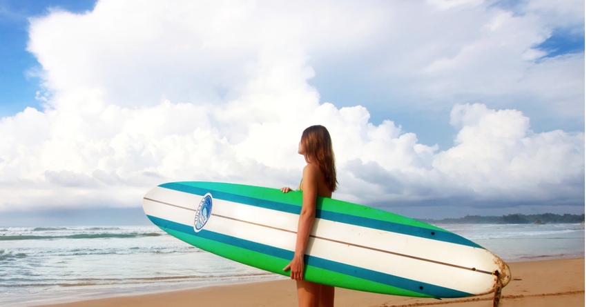 girl with acne on the beach