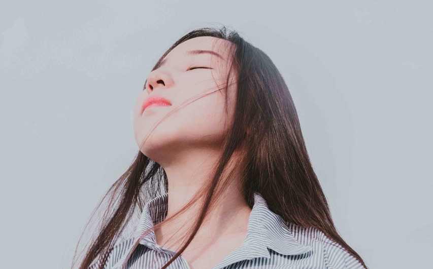 Asian girl with acne